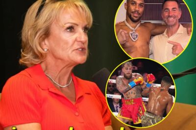 “I’LL SMASH HIM — I SWEAR.” :Jake Paul’s mum calls out Eddie Hearn. It’s gone way past trash talk now — Jake Paul’s mom has stepped into the chaos with a furious, no-filter blast aimed straight at Eddie Hearn, branding him “smug” and openly saying she wants to swing on him. The comments hit like gasoline on an already raging feud, turning a boxing rivalry into a full-on family war — loud, personal, and impossible to ignore.k